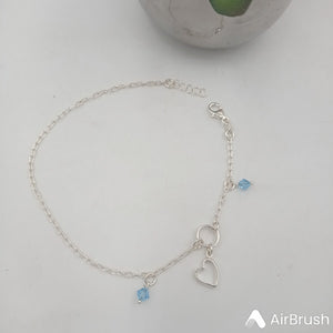 Tobillera con Silueta de Corazon y Circones Azul en Plata 925