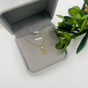 Cadena con Dije de Silueta Corazón en Oro 18k