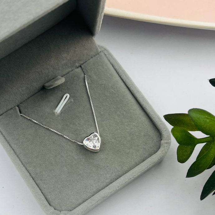 Cadena con Dije de Corazón Punto Luz 7mm en Plata 925